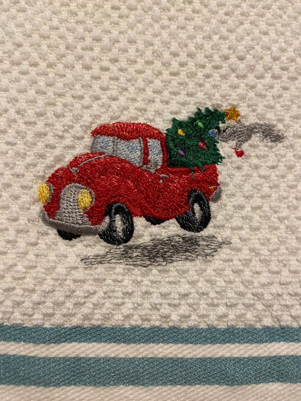 Bringing home the Christmas tree kitchen towel