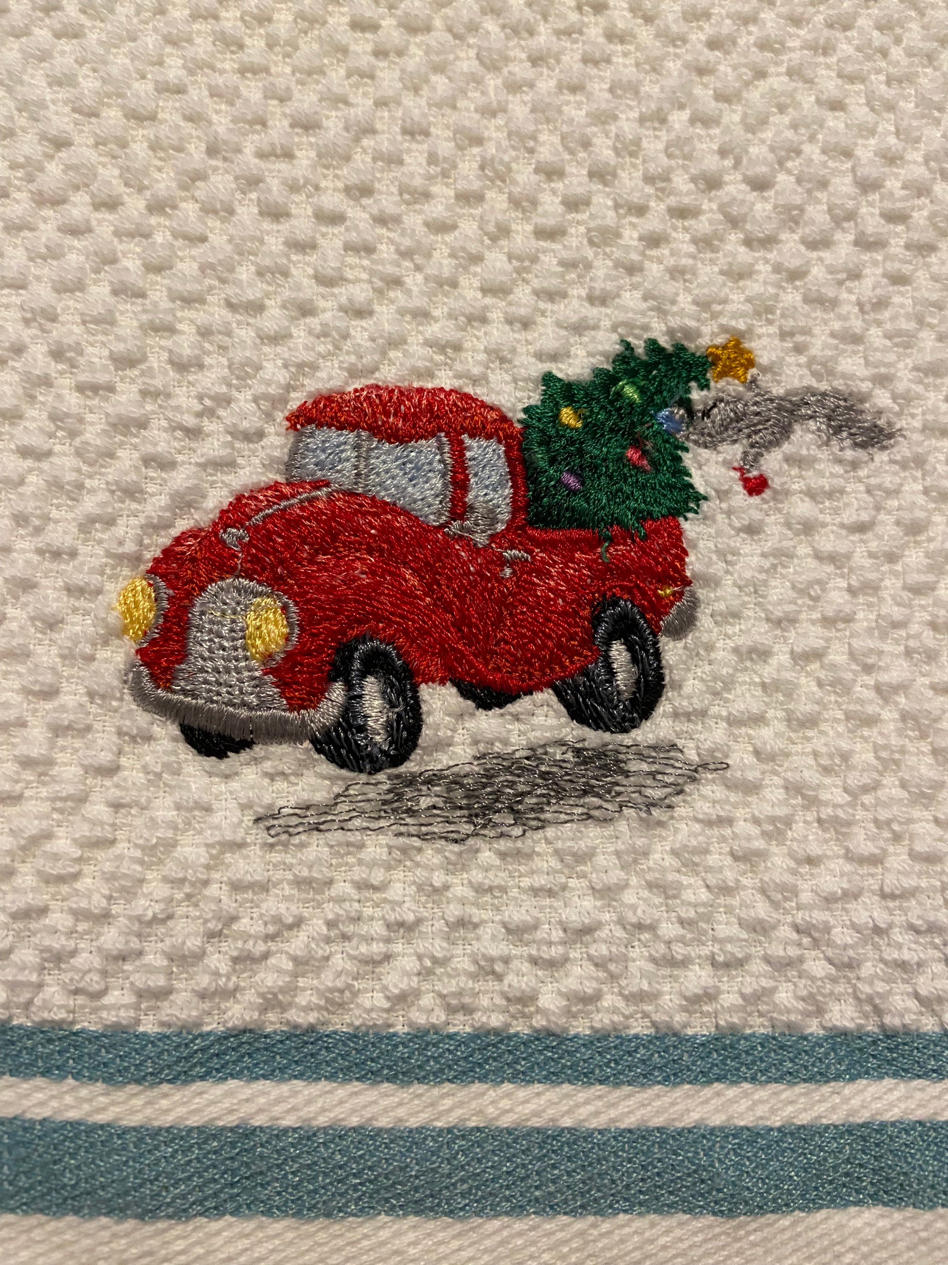 Bringing home the Christmas tree kitchen towel
